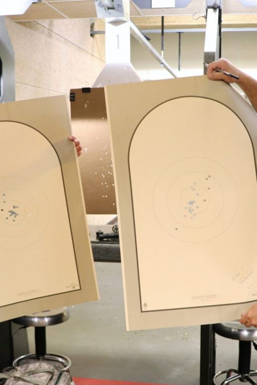 Two competitors showing off their targets