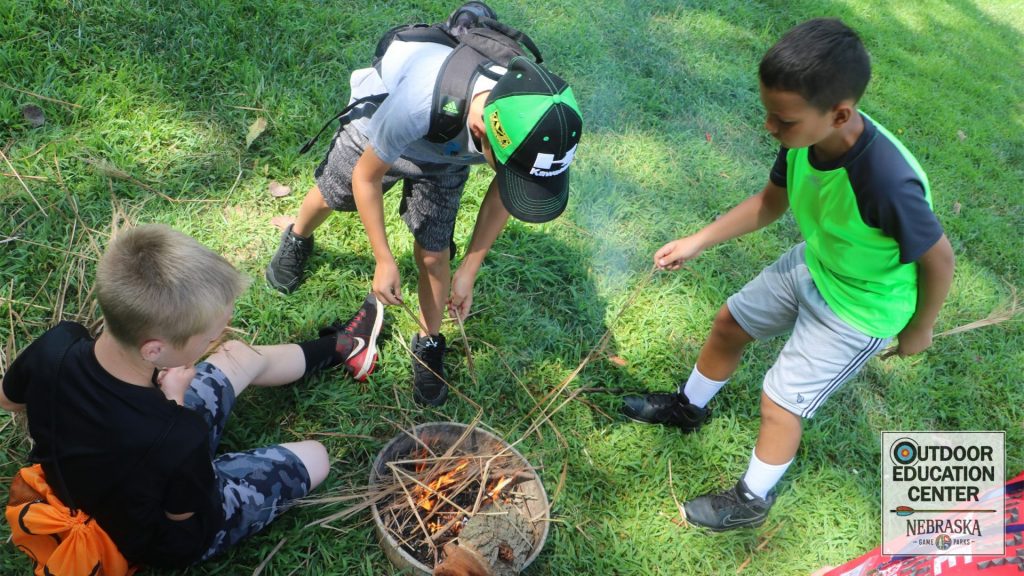 campers build a fire