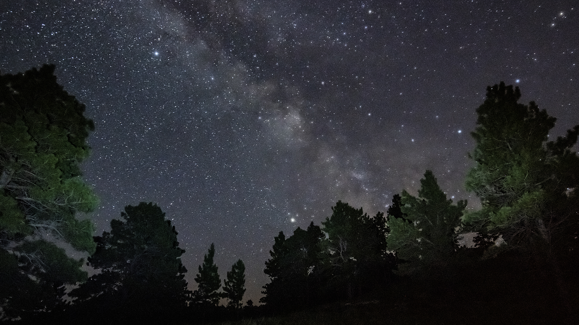 hills at night with stars