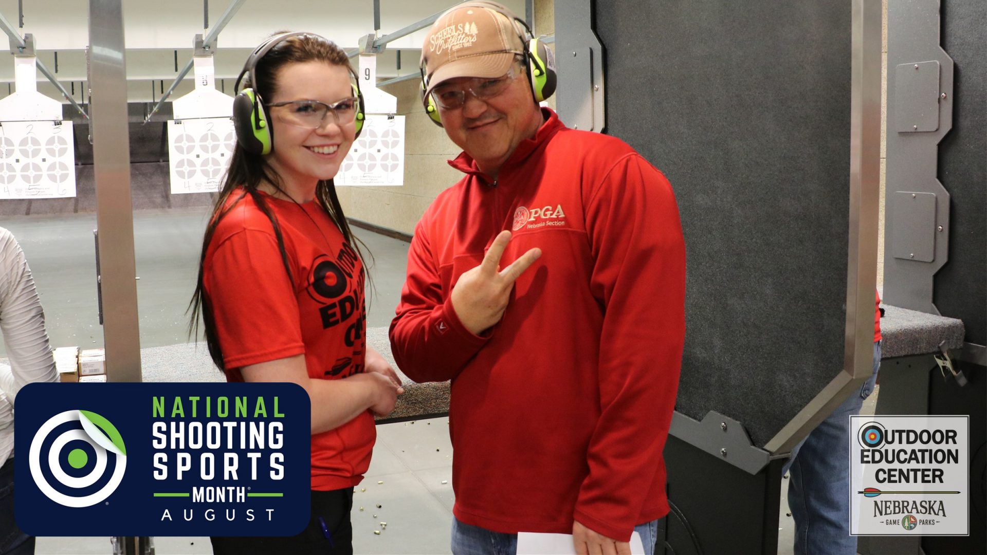 Instructor and student in firearm range