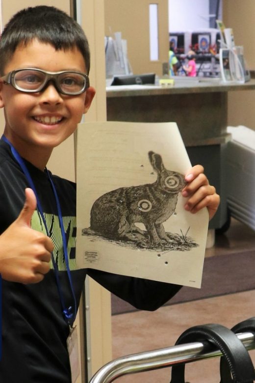Youth participant with rabbit target