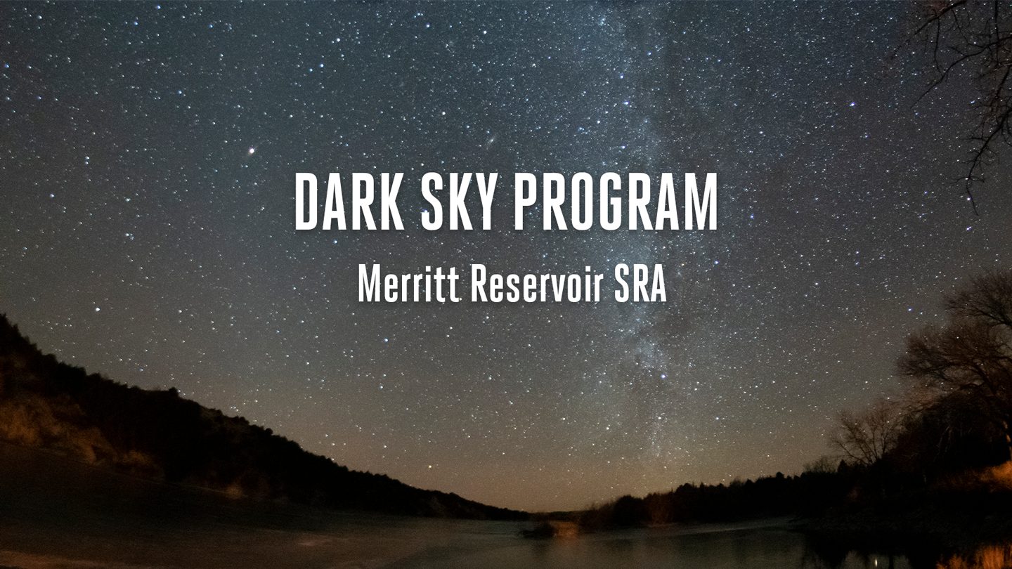 A starry landscape with the words Dark Sky Program at Merritt Reservoir SRA.