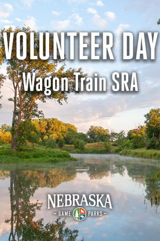Event graphic for Volunteer Day at Wagon Train SRA featuring Wagon Train Lake.
