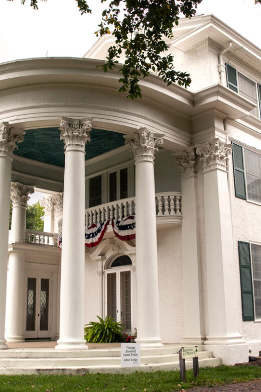 Exterior of Arbor Lodge Mansion on a cloudy fall day