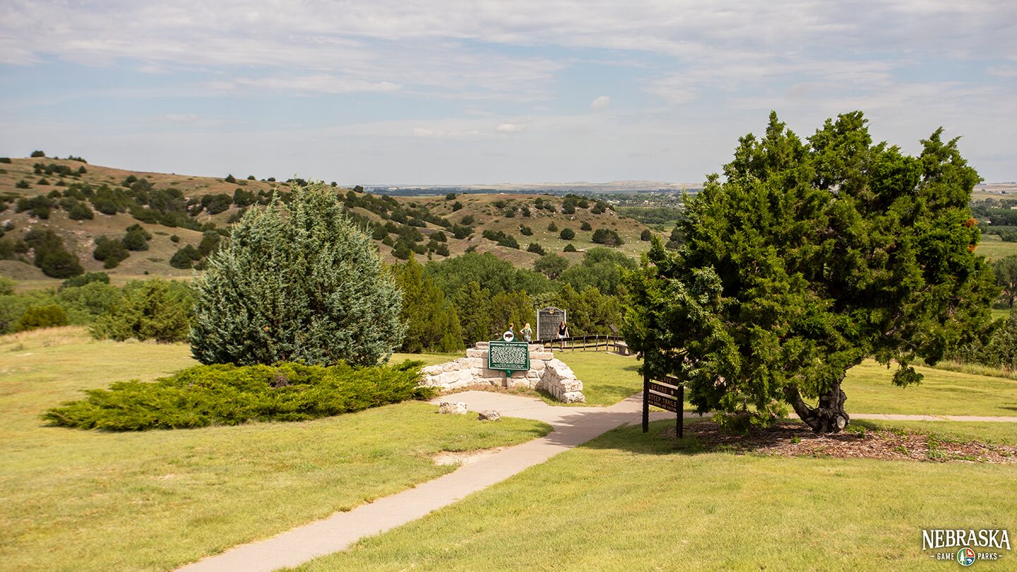 View of the trail from the visitor center at Ash Hollow State Historical Park that leads to the cave and historical marker.