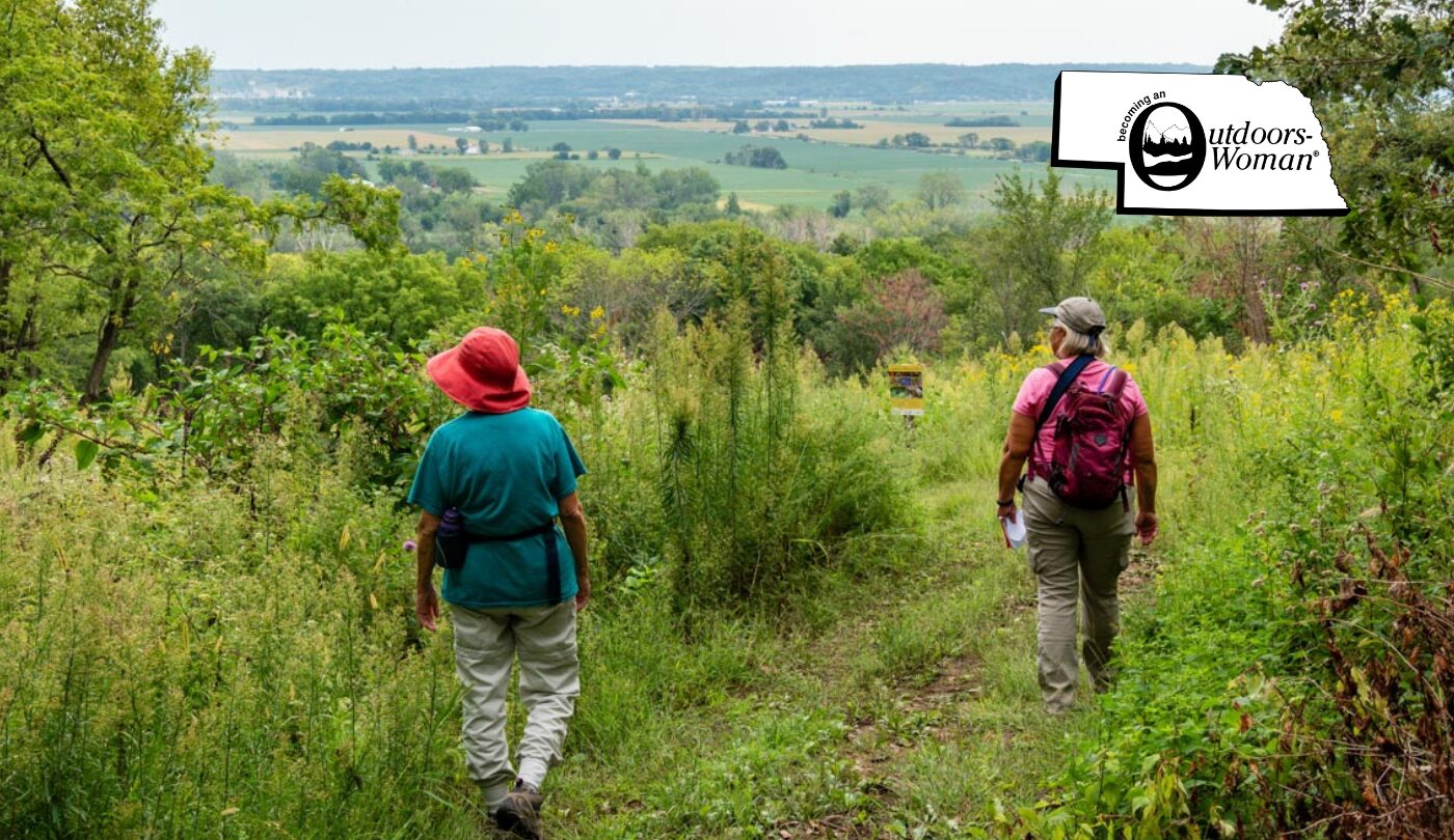 Two women hiking in a park.