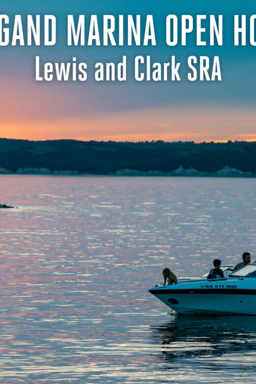 People boating at sunset near Weigand Marina at Lewis and Clark SRA.