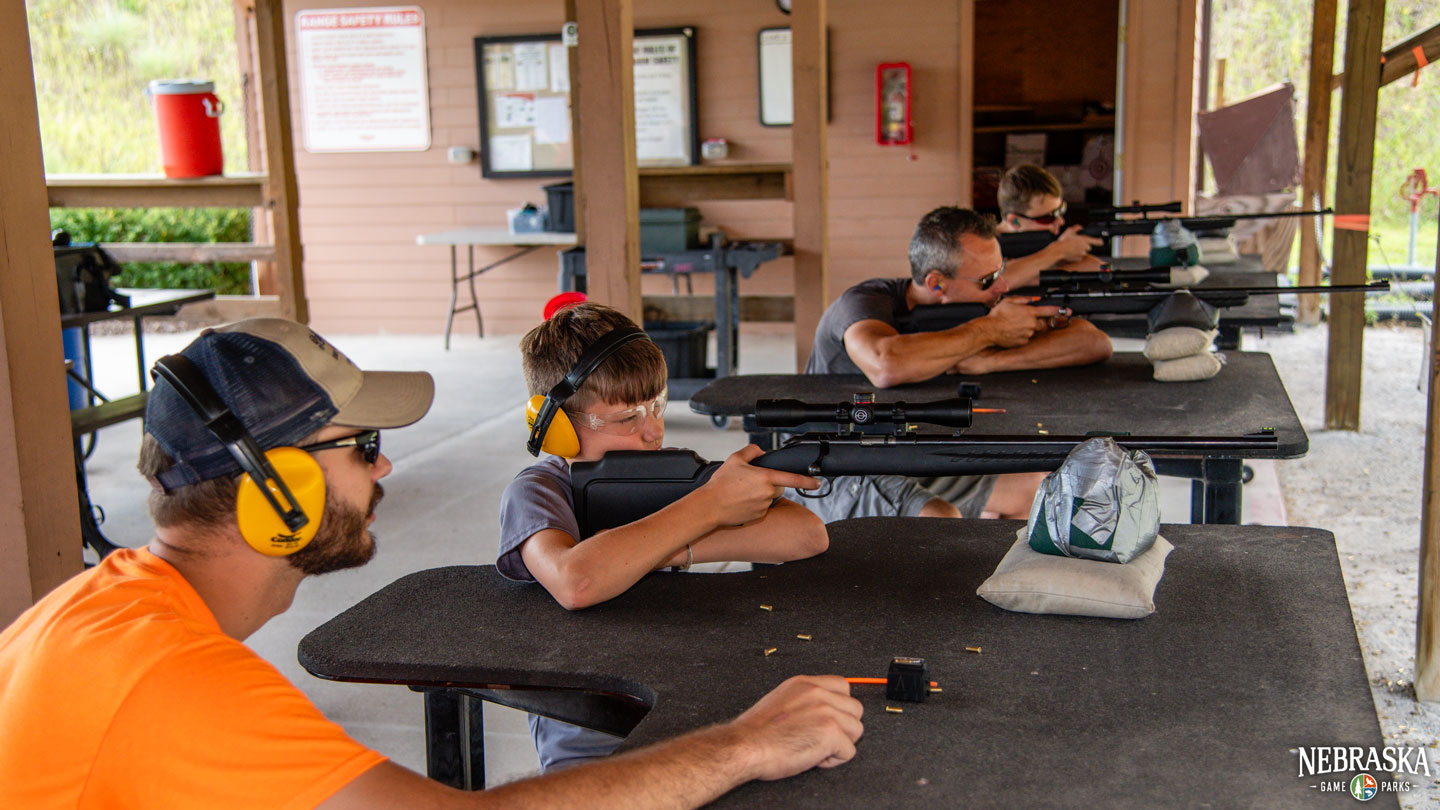 People practice target shooting at the outdoor range at Platte River State Park.
