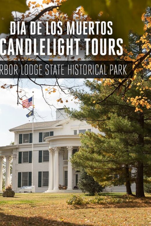 A view of Arbor Lodge Mansion in the fall through the trees.