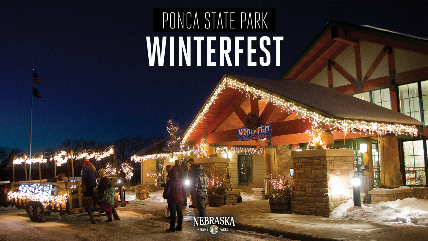 Lighted hayrack rides and holiday lights at Ponca State Park Winterfest event.